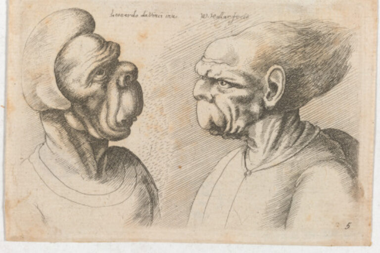 TWO DEFORMED HEADS FACING INWARDS