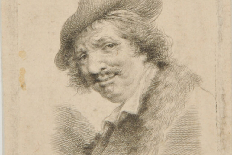 HEAD OF MAN, TURNED TO LEFT, WEARING ROUND CAP