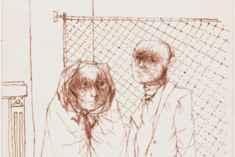MAN AND WOMAN IN FRONT OF A FENCE