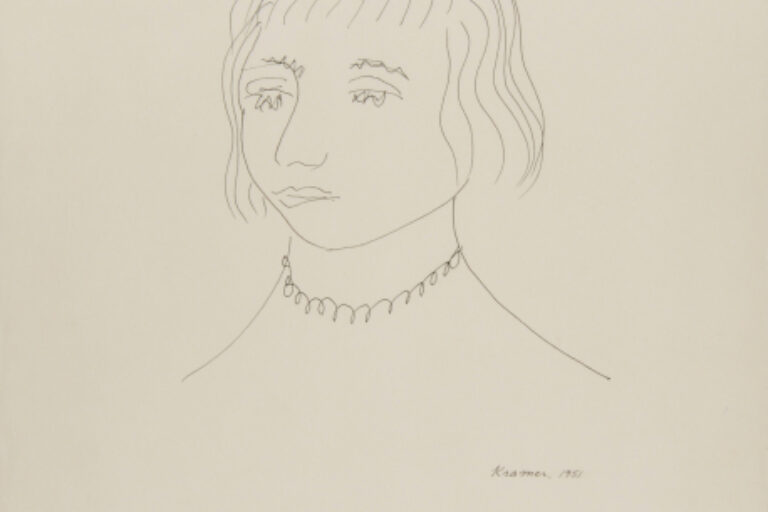 WOMAN WEARING A NECKLACE