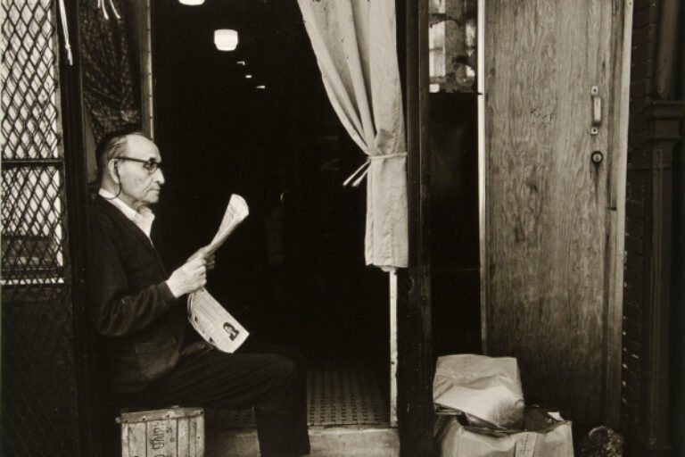 SOLOMON FAIRMAN READING HIS DAILY YIDDISH NEWSPAPER