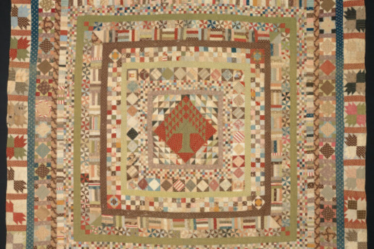 PINE TREE CENTER MEDALLION QUILT WITH FIFTEEN BORDERS