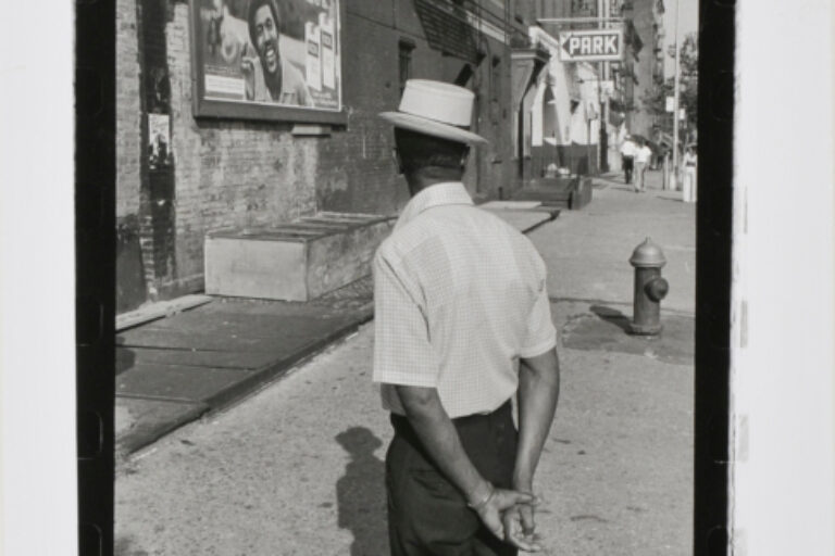MAN WITH HAT AND KOOL ADVERTISEMENT, NEW YORK