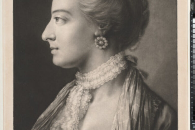 YOUNG WOMAN IN PROFILE TO THE LEFT
