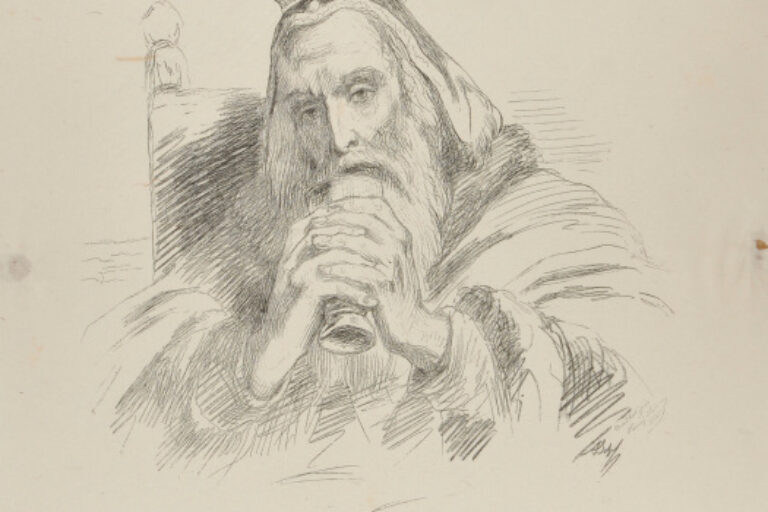 MAN SEATED IN CHAIR HOLDING CUP