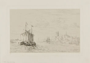 Harbor with boats on the sea and town in the distance